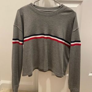 grey long sleeve with red white and blue stripes